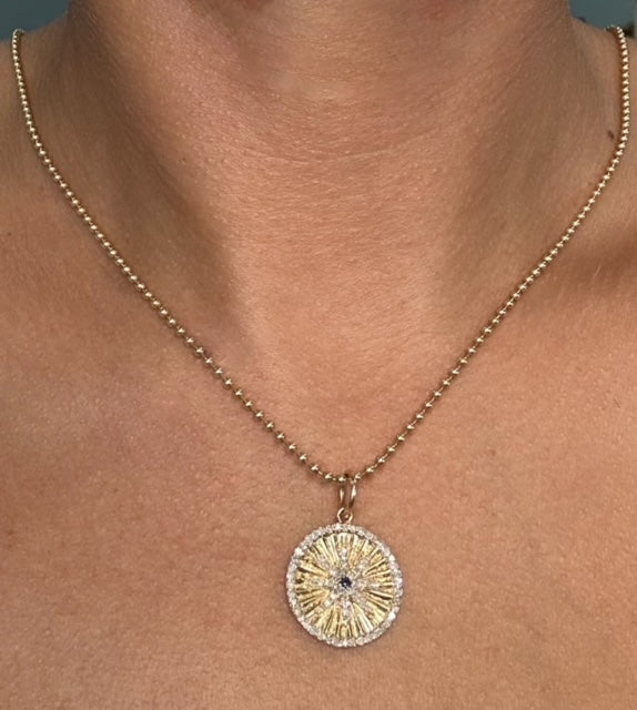 14K YG Circle pendant with star design and stone accents